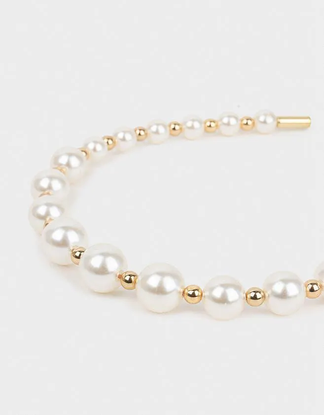 Cintillo con perlas
