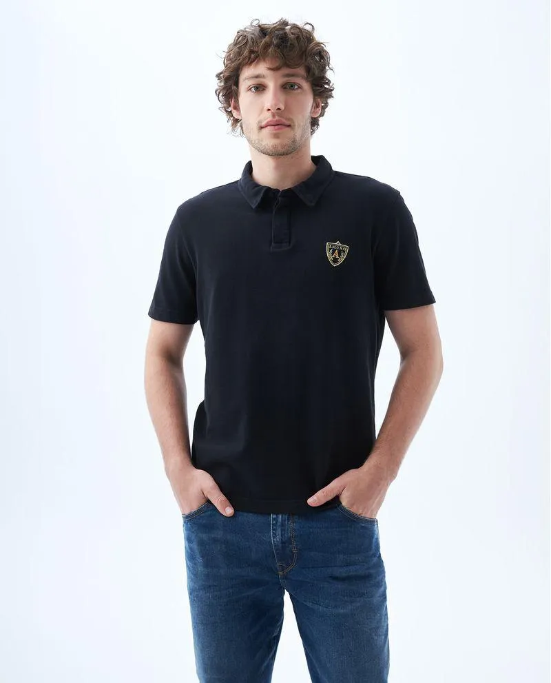 Polo con perilla de botones oculta para hombre