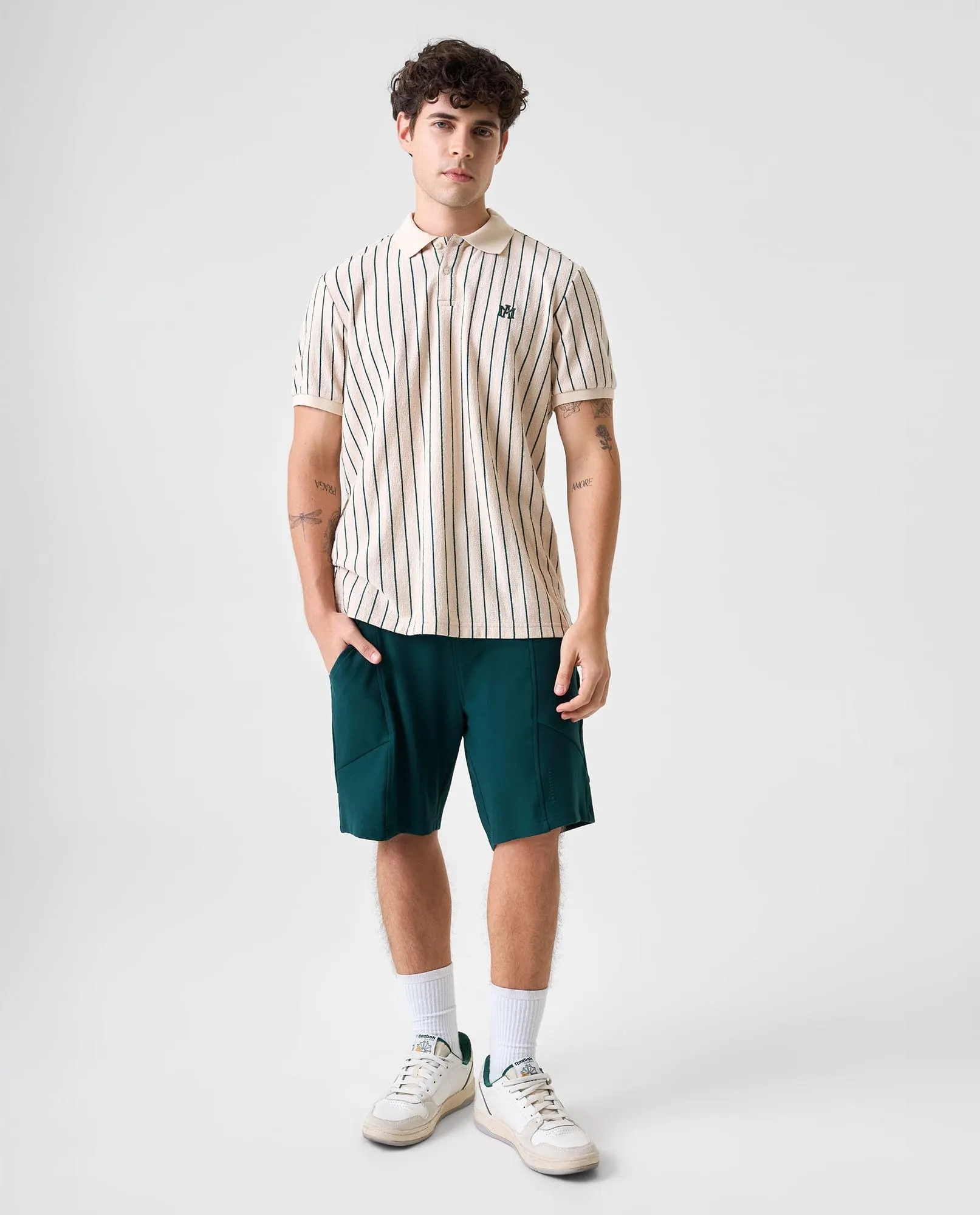 Polo de tela texturizada a rayas para hombre