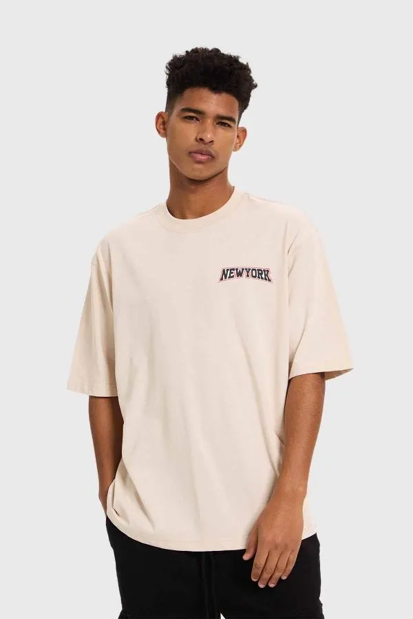 Polera hombre print flamas beige