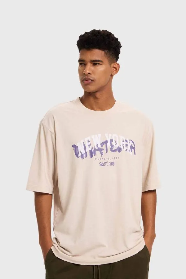 Polera hombre college graffiti beige