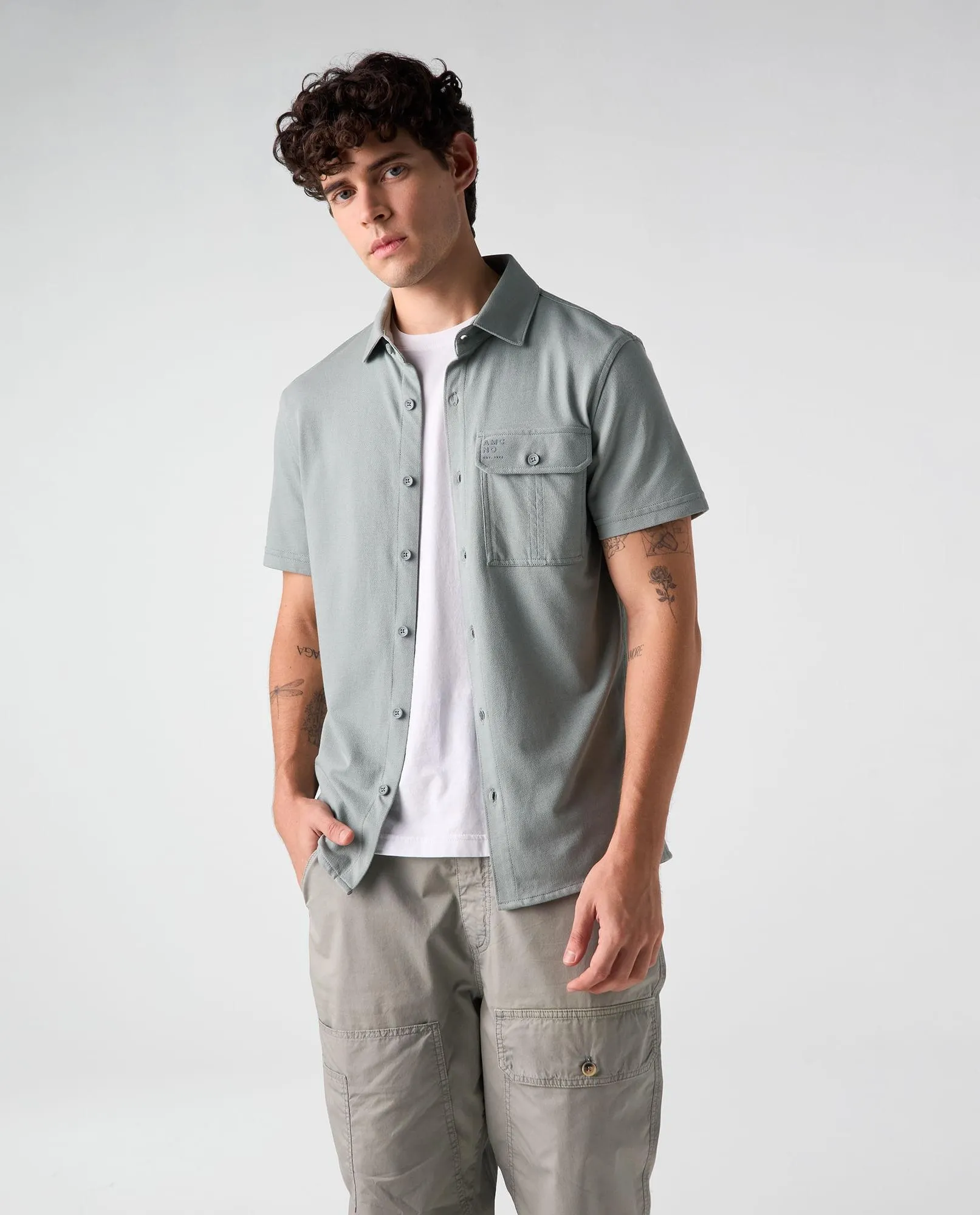 Polo Slim con bolsillo de parche para hombre