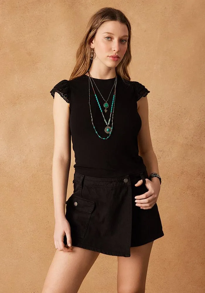 Polera mangas alitas de macrame