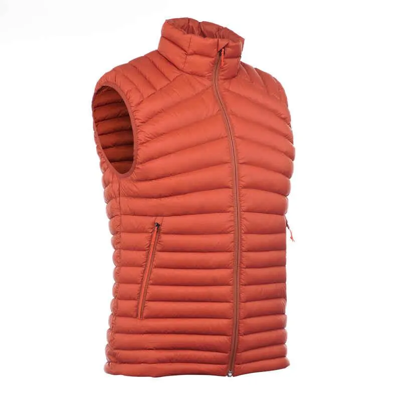 Chaleco acolchado trekking en montaña TREK 500 hombre naranja