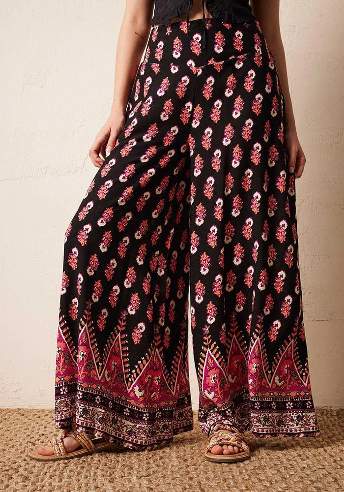 Pantalón Flare Con Pretina Elasticada