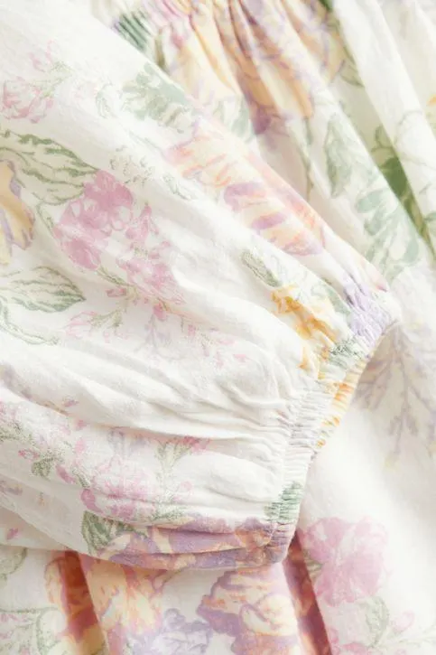 Vestido con mangas globo y espalda descubierta