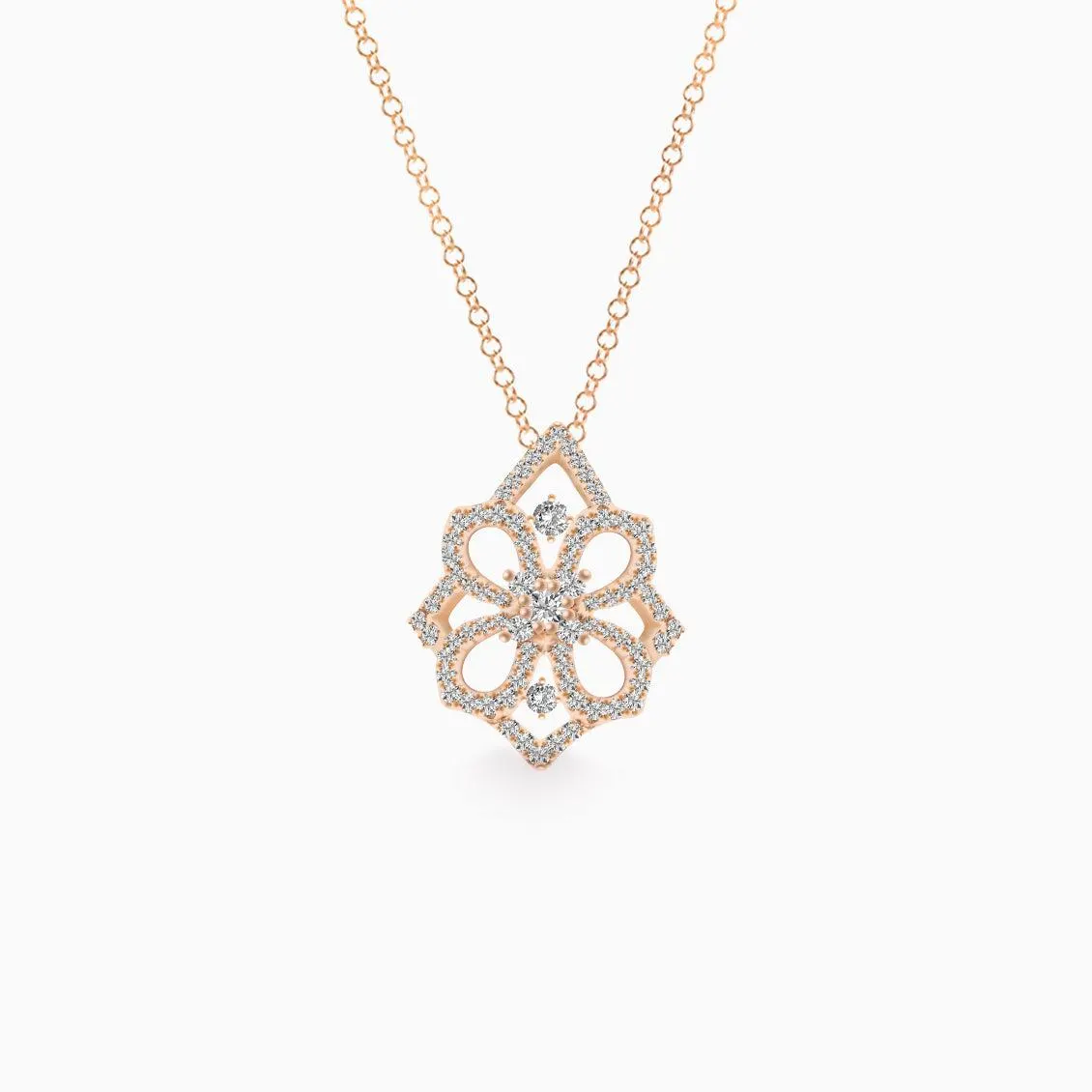 Dije en oro rosado de 18K flor calada con brillantes