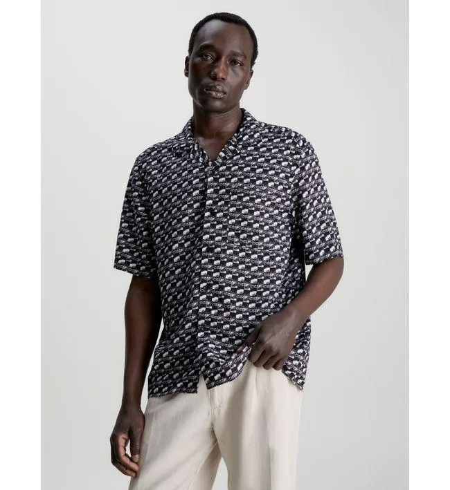 Camiseta Negro Boxy Con Estampado De Bolos