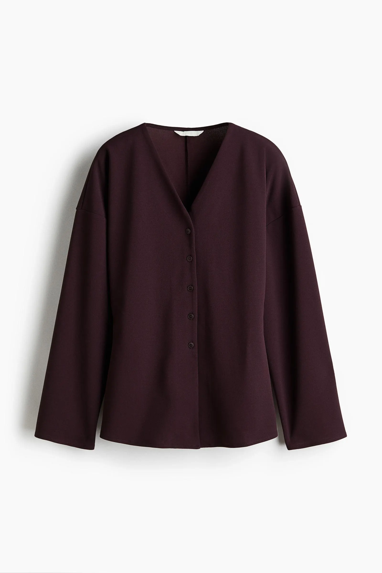 Saco con cierre de botones delante