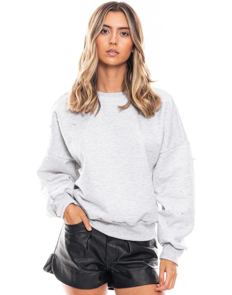 Buzo Cuello Redondo Con Aplicaciones De Perlas