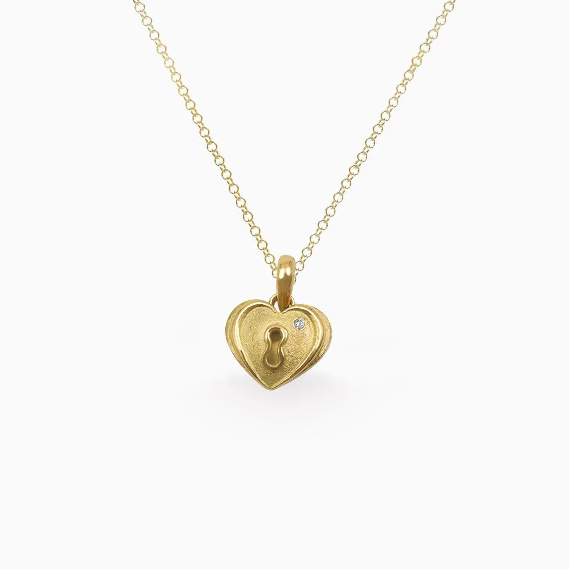 Dije en oro amarillo de 18K corazón candado con brillante