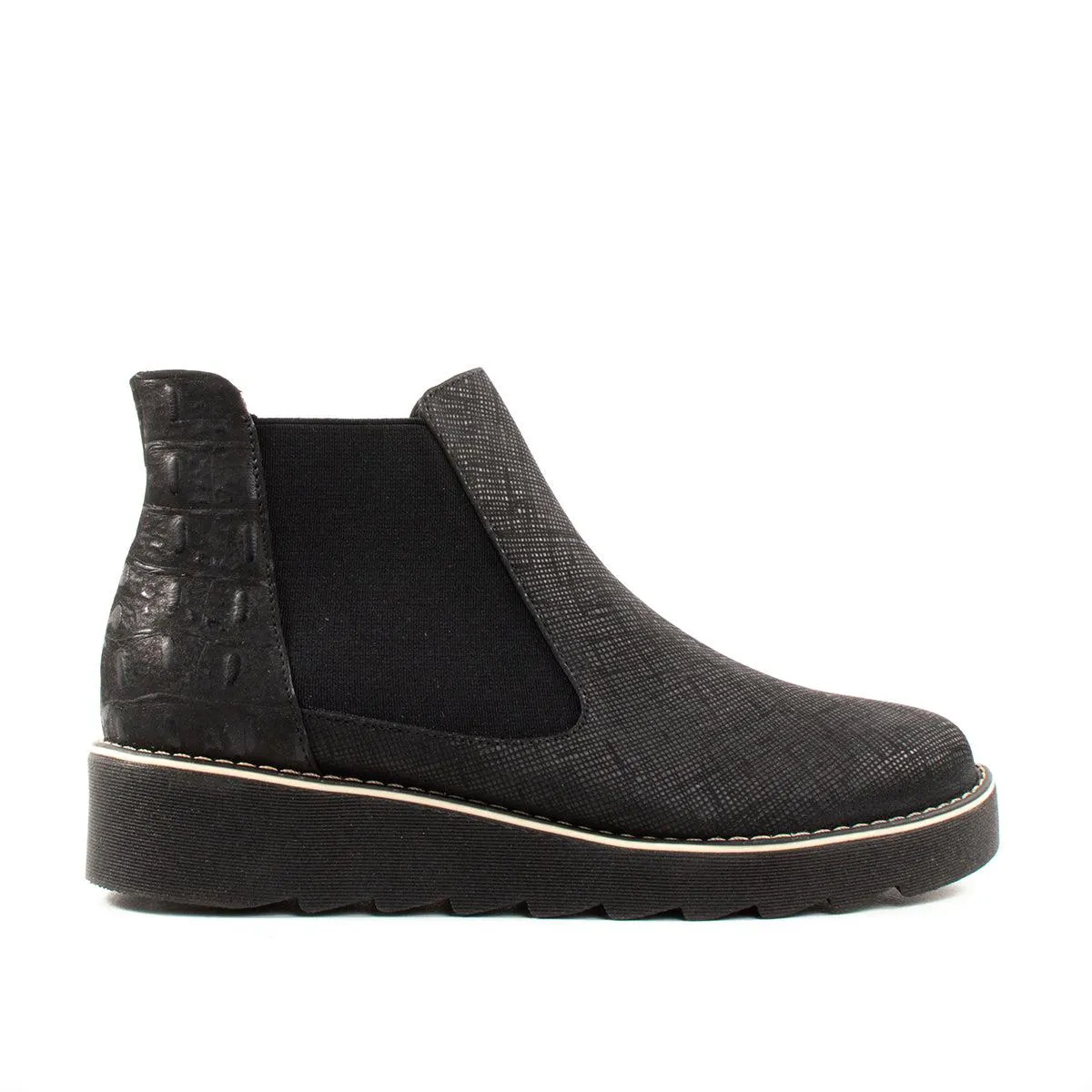 Botín de cuero color negro con bandas elásticas, para dama