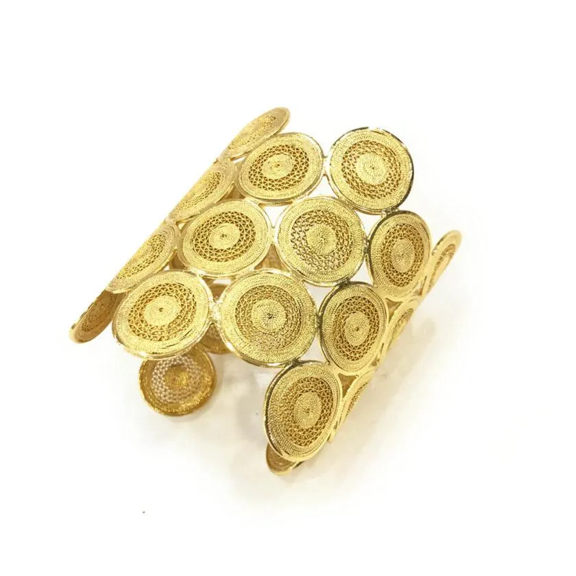 Brazalete Circulos en plata filigrana dorada