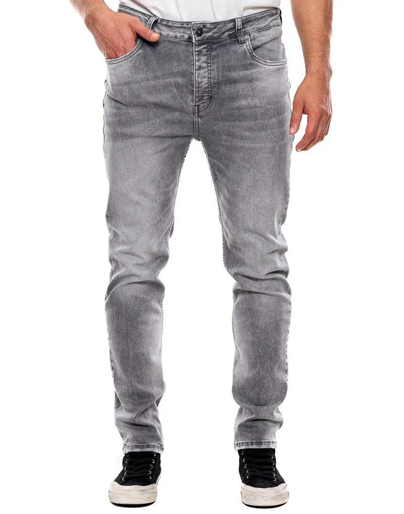 Slim Fit Jeans Tono Medio Con Botonadura Interna