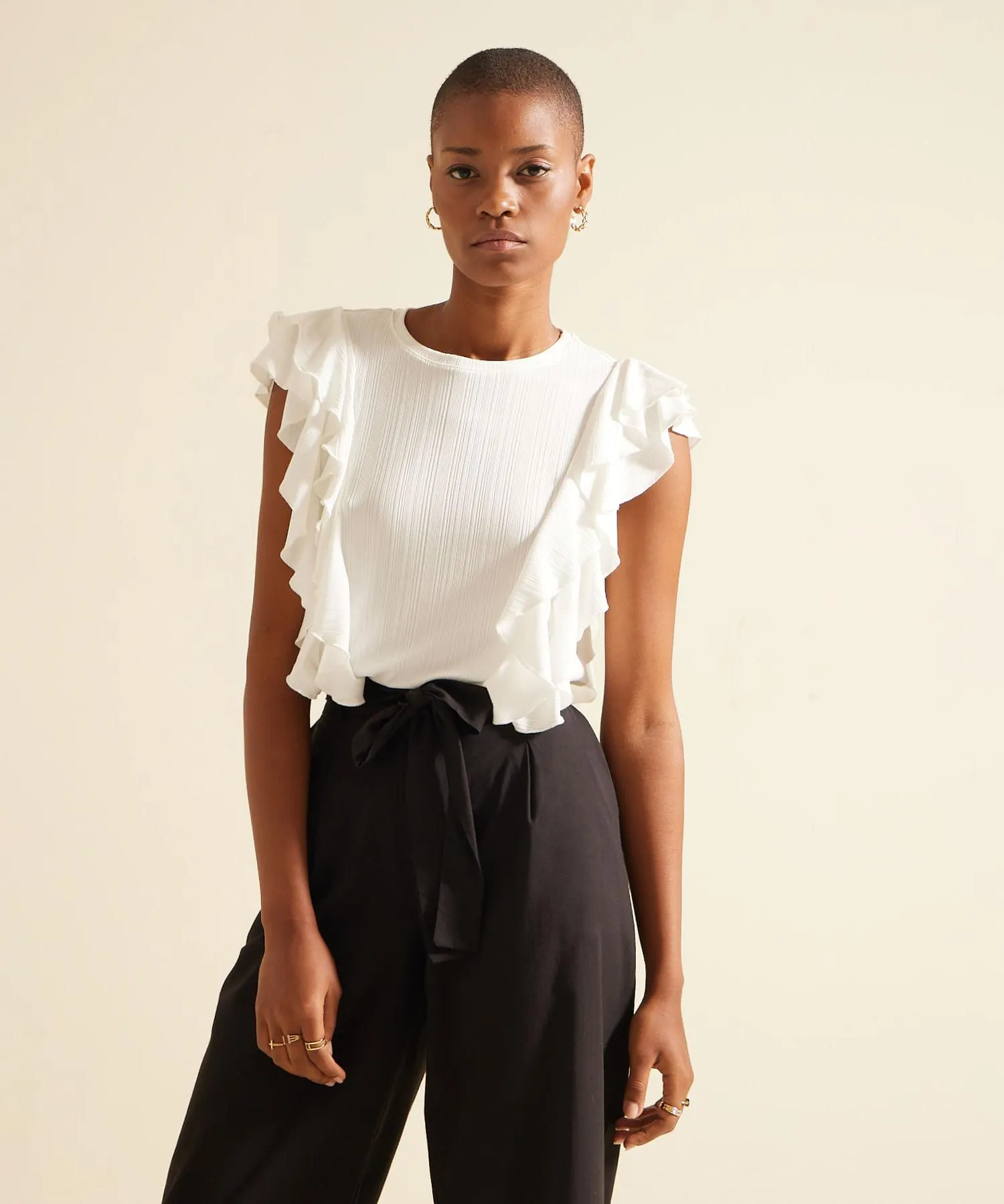 Camiseta Unicolor Con Arandela En Frente