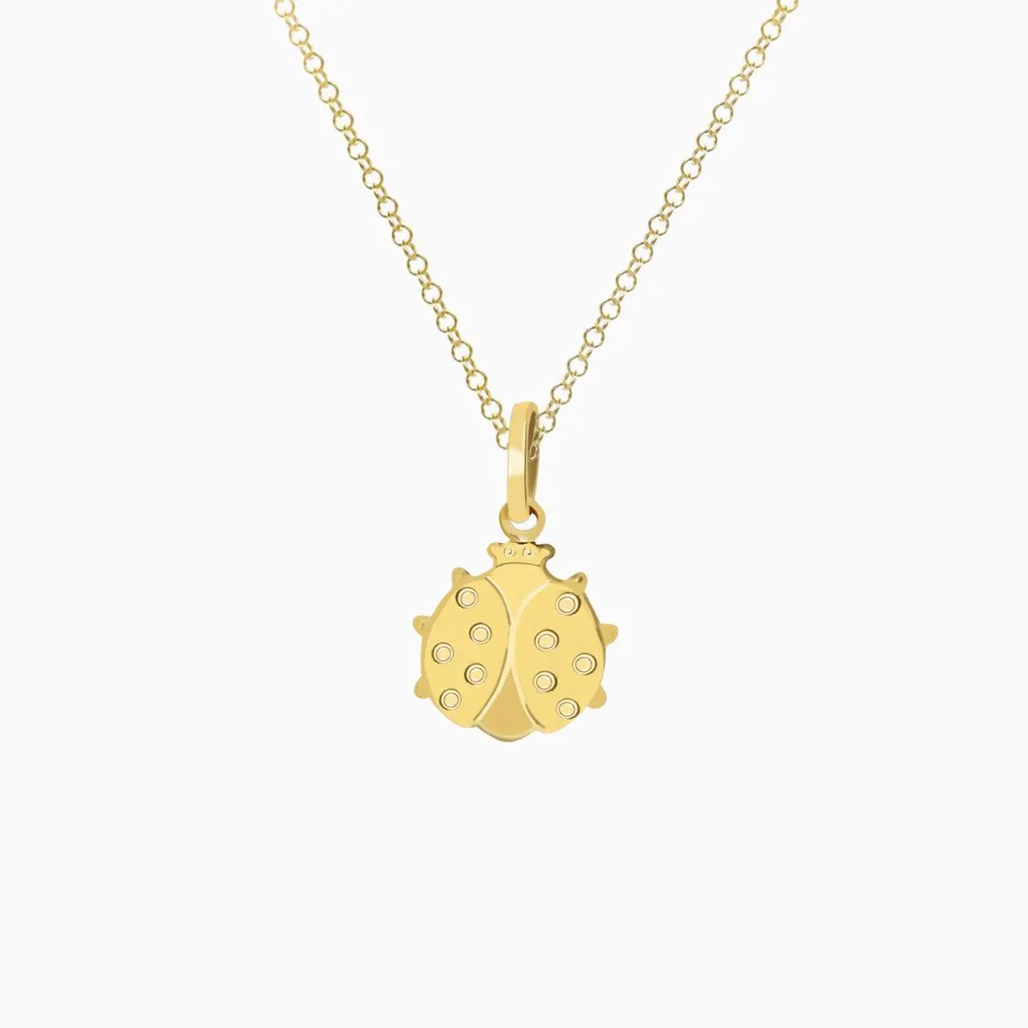 Dije en oro amarillo de 18K mariquita