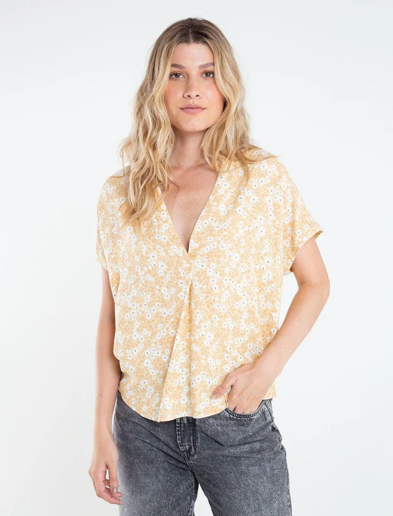 Camisa con largo asimétrico