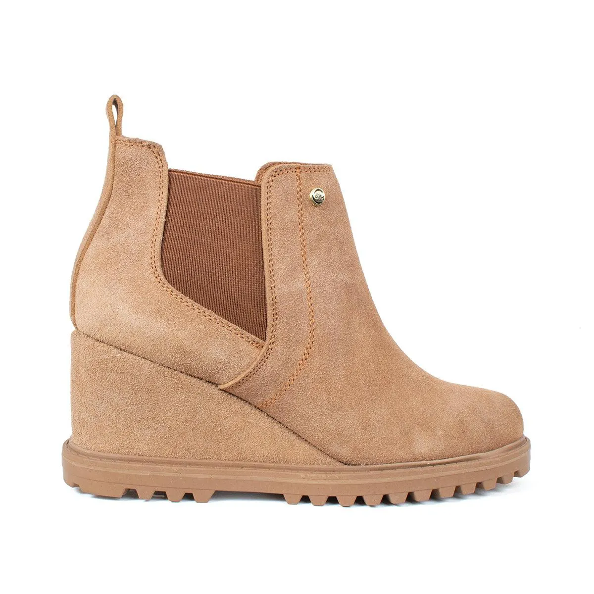 Botines en cuero color miel, con resorte lateral