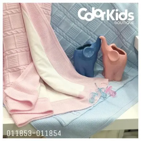 MANTA ROSADA TRENZADA EN HILO TRADICIONAL NINA REF 9607 DOBLE FAZ