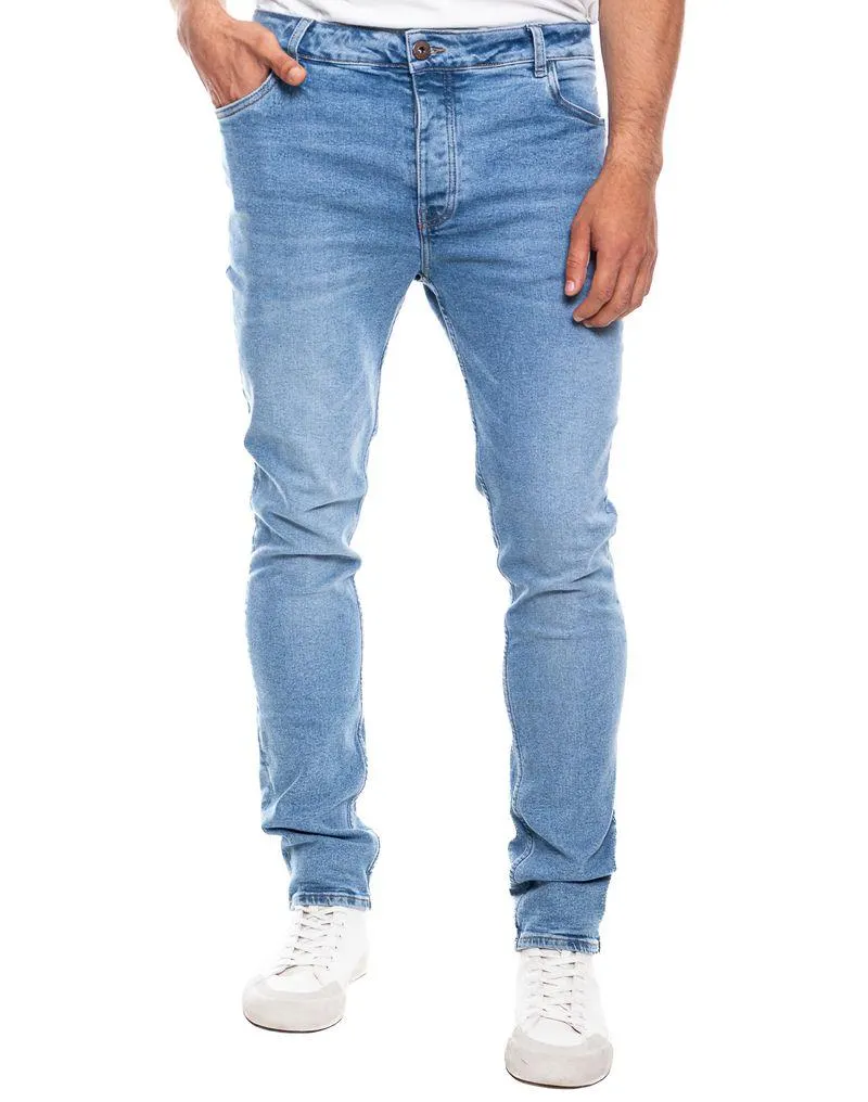 Skinny Fit Jeans Tono Medio Con Botonadura Interna