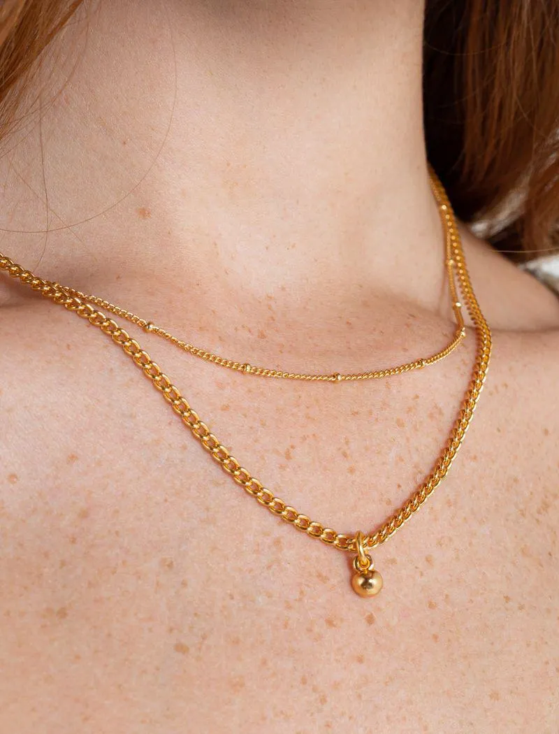 Dúo de cadenas con mini dije