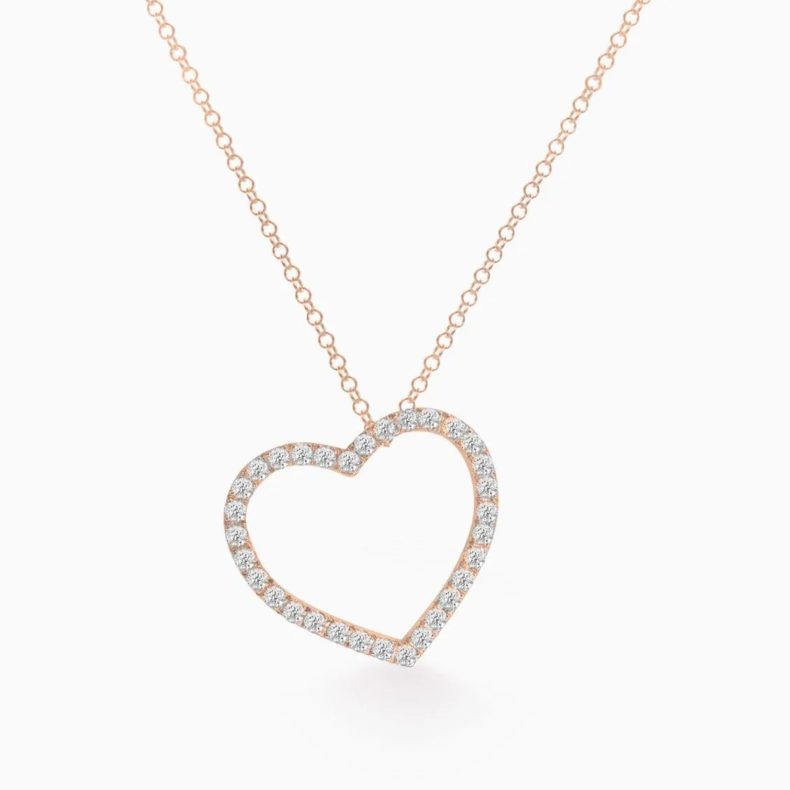 Dije en oro rosado de 18K silueta de corazón con brillantes