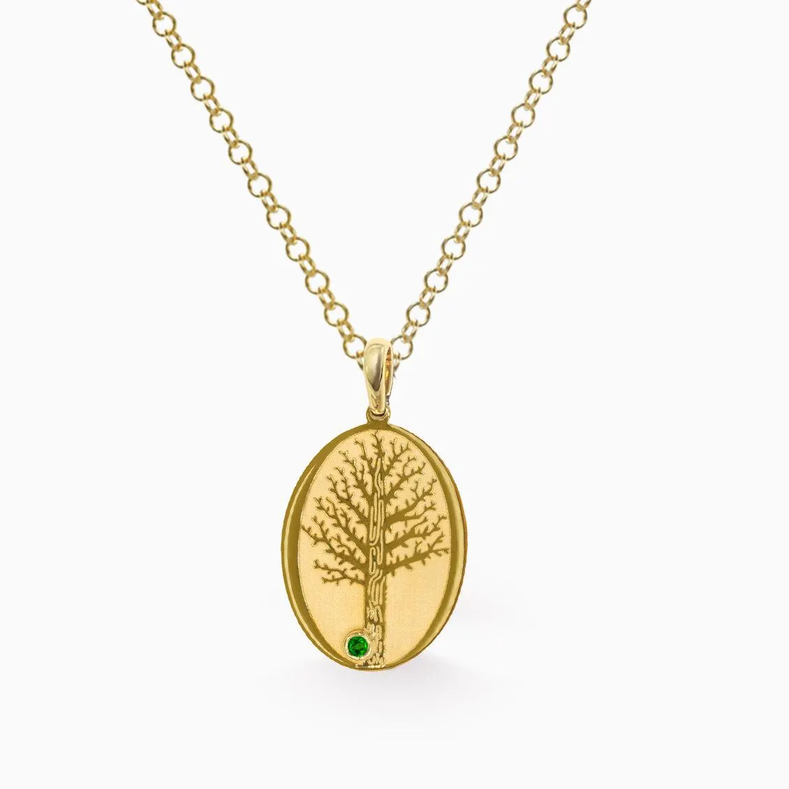 Dije Siena en oro amarillo de 18K árbol con esmeralda