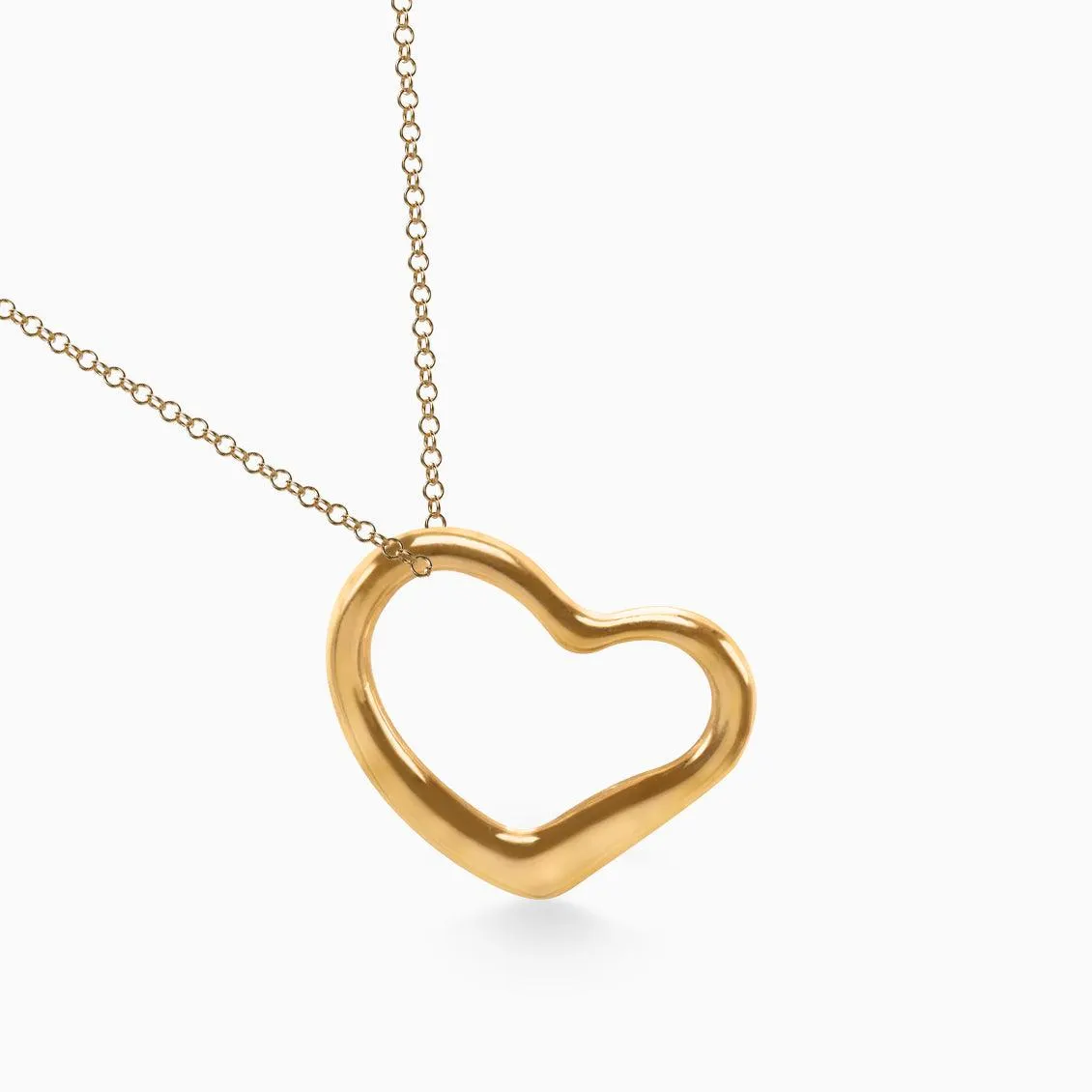 Dije en oro rosado de 18K en forma de corazón
