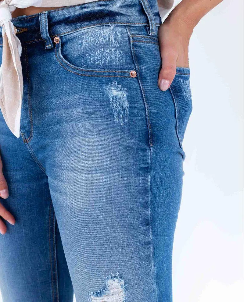 Jean para mujer medio claro Skinny tiro súper alto con raspones