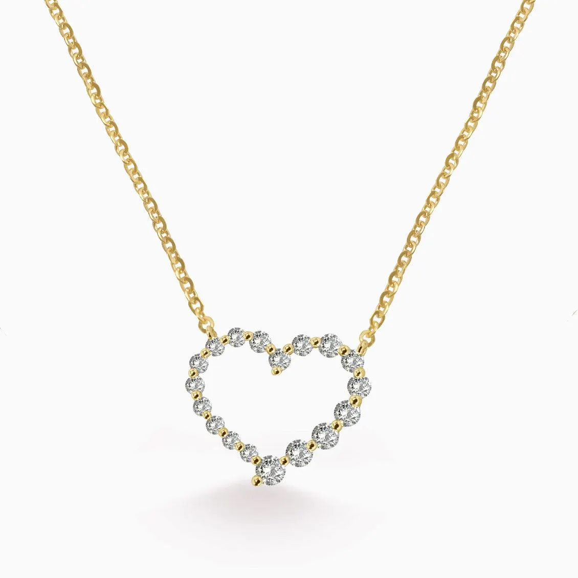 Collar en oro amarillo de 18K con corazón calado con brillantes