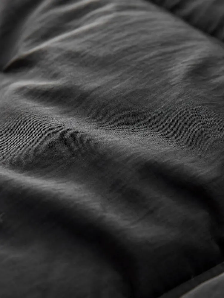 Černý - Voděodolný prošívaný kabát střední délky