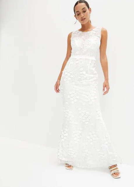 Brudklänning i mesh med blomapplikationer