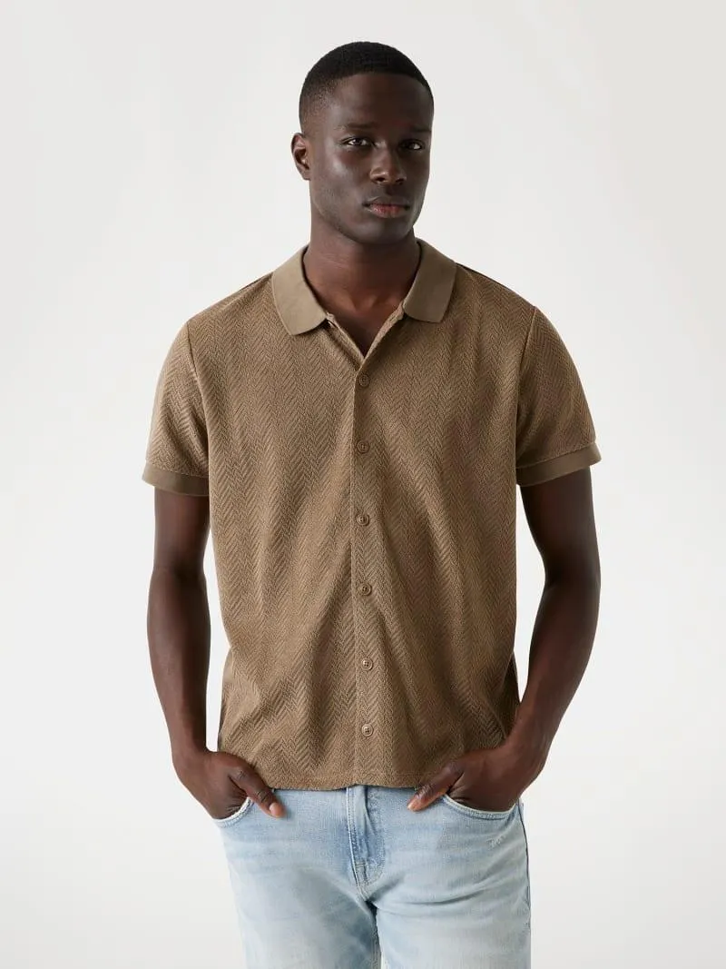 Polo camisero de punto con botón