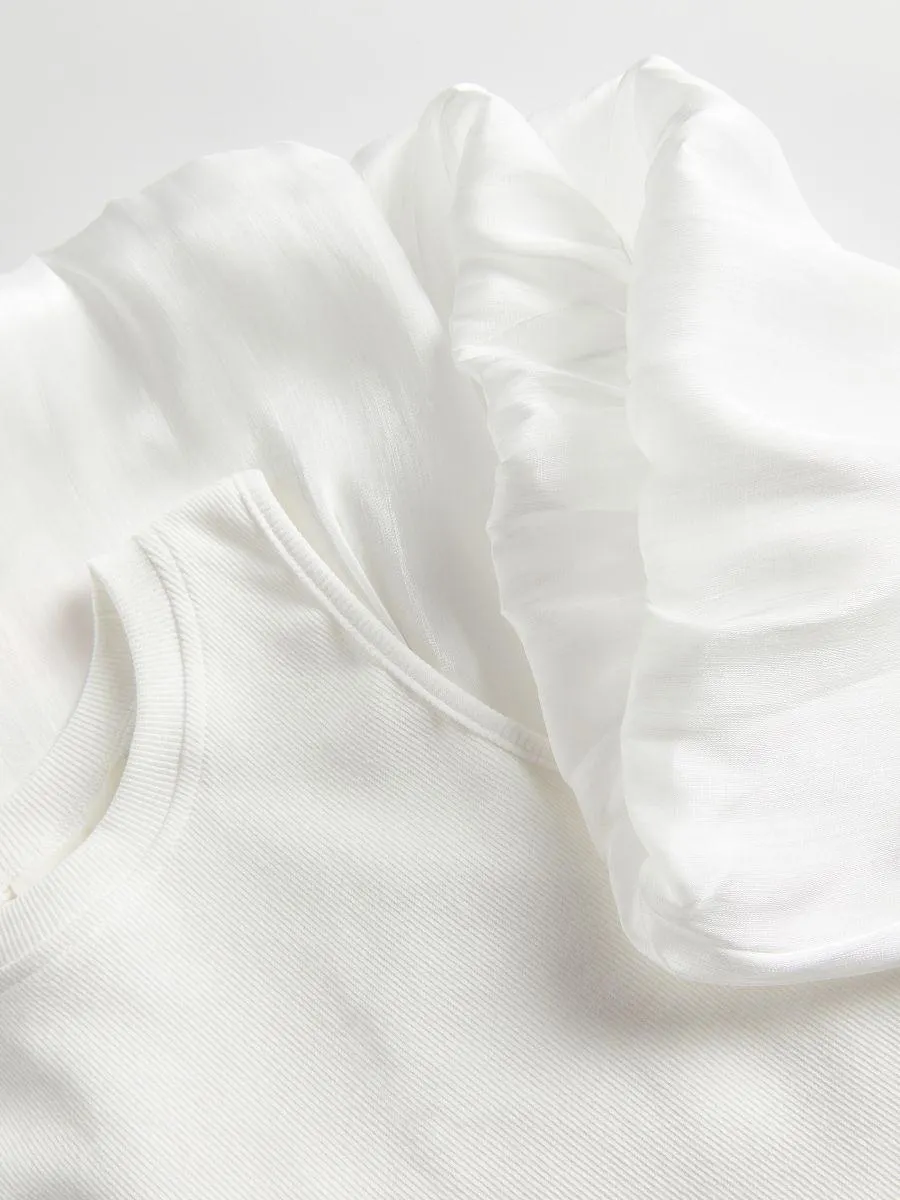 Šaty s ozdobnou spodní částí