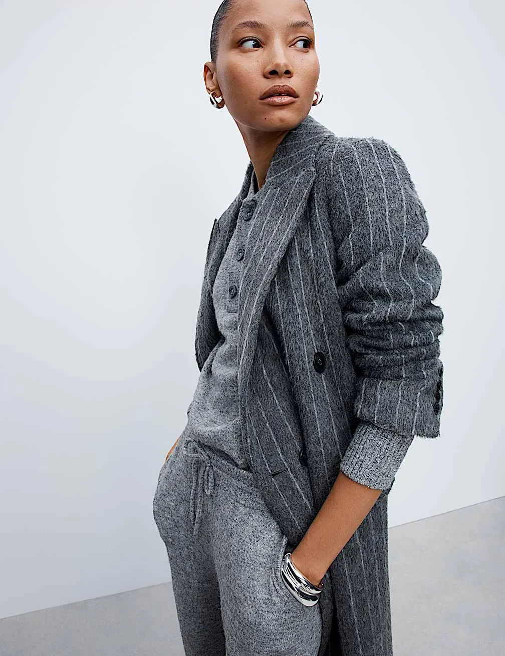 Pullover mit Kragen und durchgehender Knopfleiste