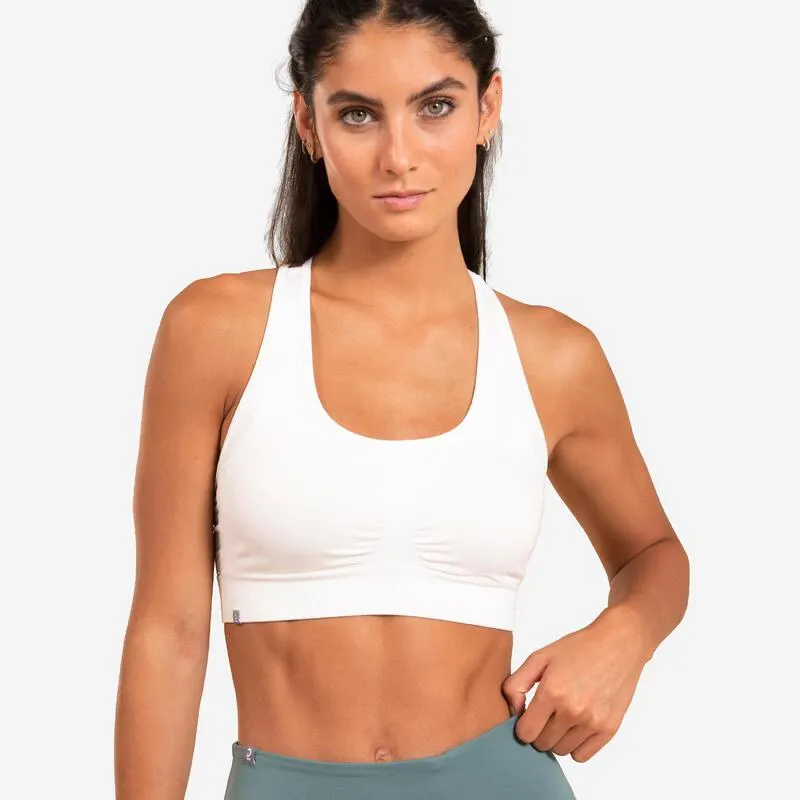 Top sportivo donna yoga senza cuciture traspirante sostegno leggero bianco