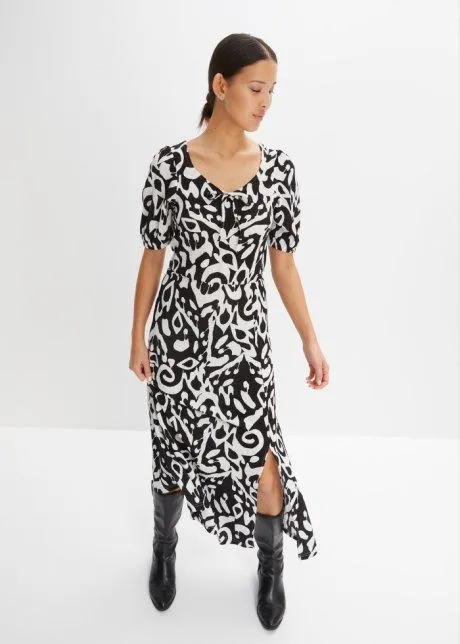 Klänning i jerseycrepe med lång slits