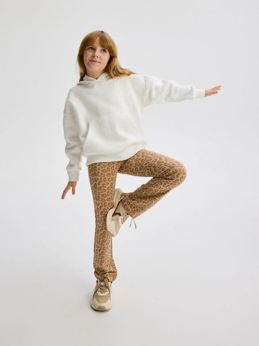 Vzorované zvonové kalhoty