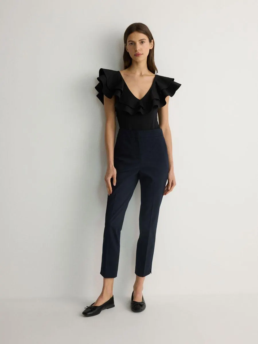 Cigaretové kalhoty s nažehlenými puky