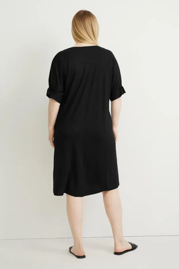 Šaty s výstřihem ve tvaru V