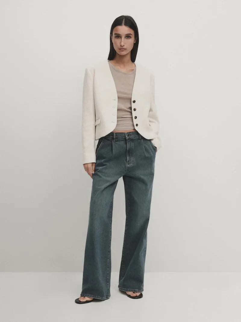 Short jacket with shoulder pads