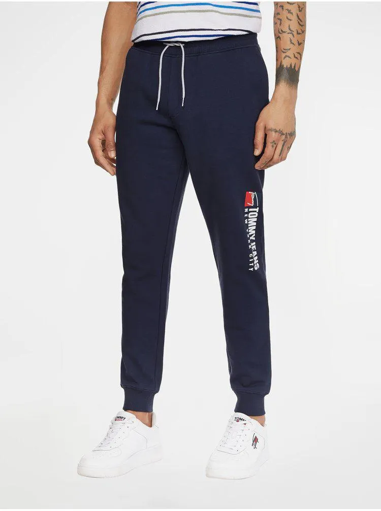 Tmavě modré pánské tepláky Tommy Jeans