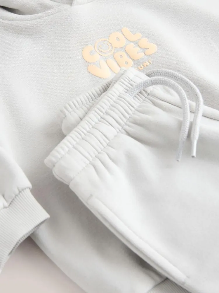 světle modrá - Sada mikiny s kapucí a Jogger kalhoty s potiskem Cool Vibes (3měsíců-7let)