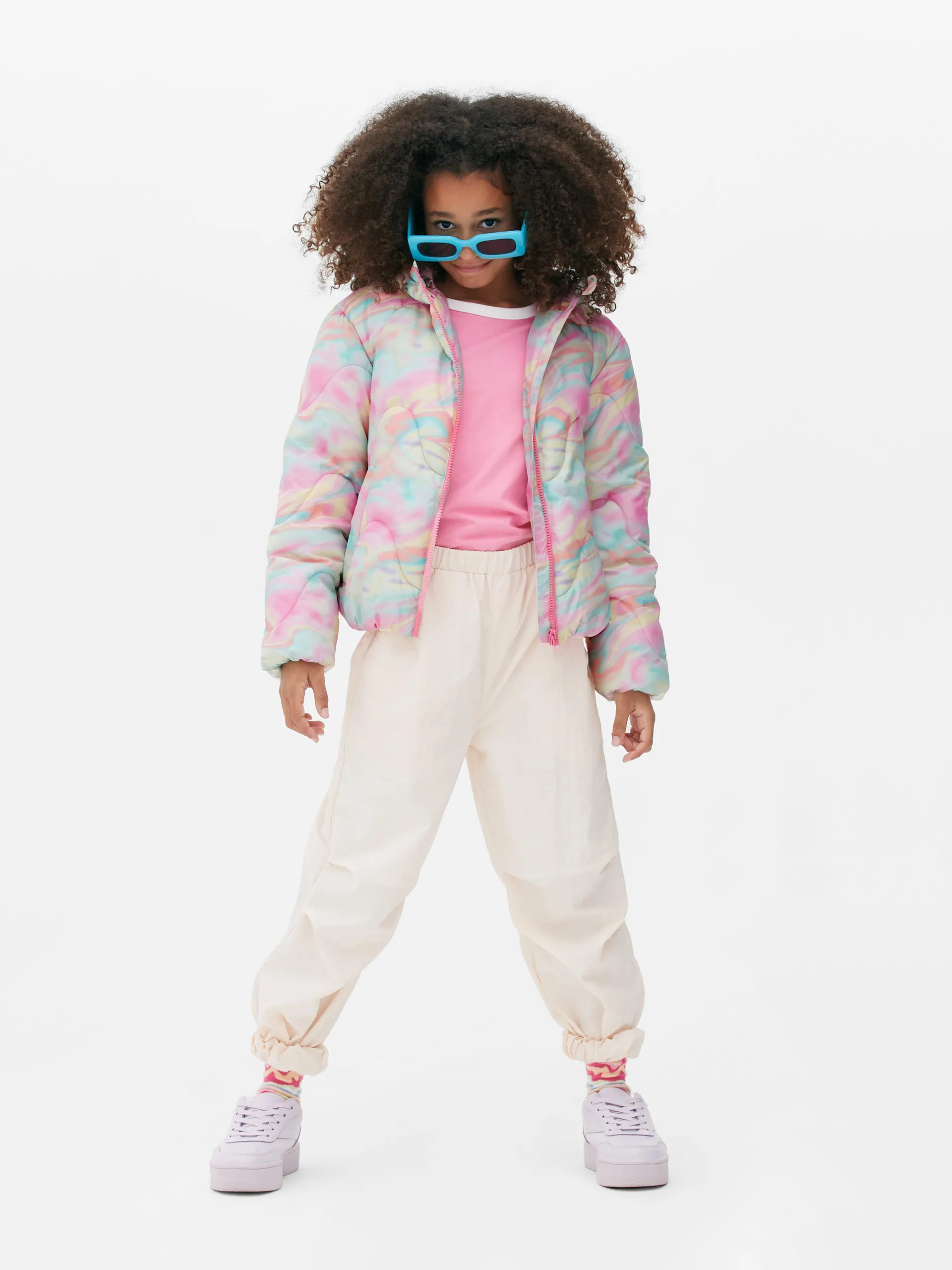 Prošívaná bunda s abstraktním potiskem