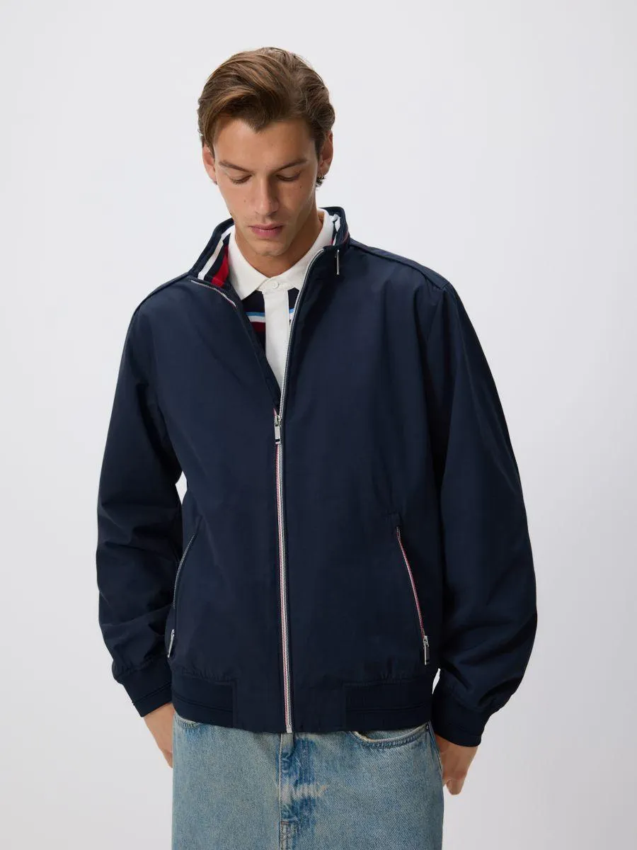 Bunda se skrývatelnou kapucí