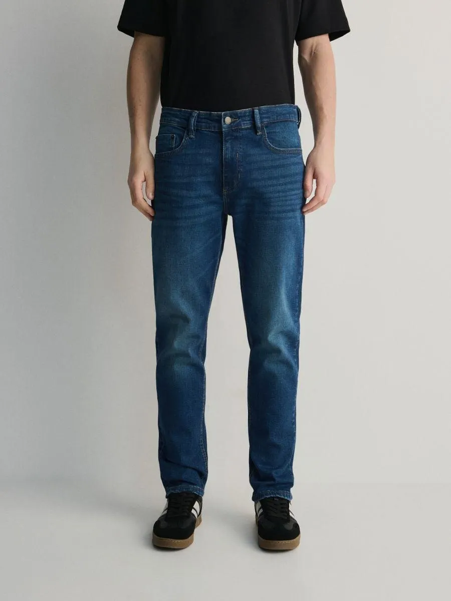 Džíny slim se sepraným efektem