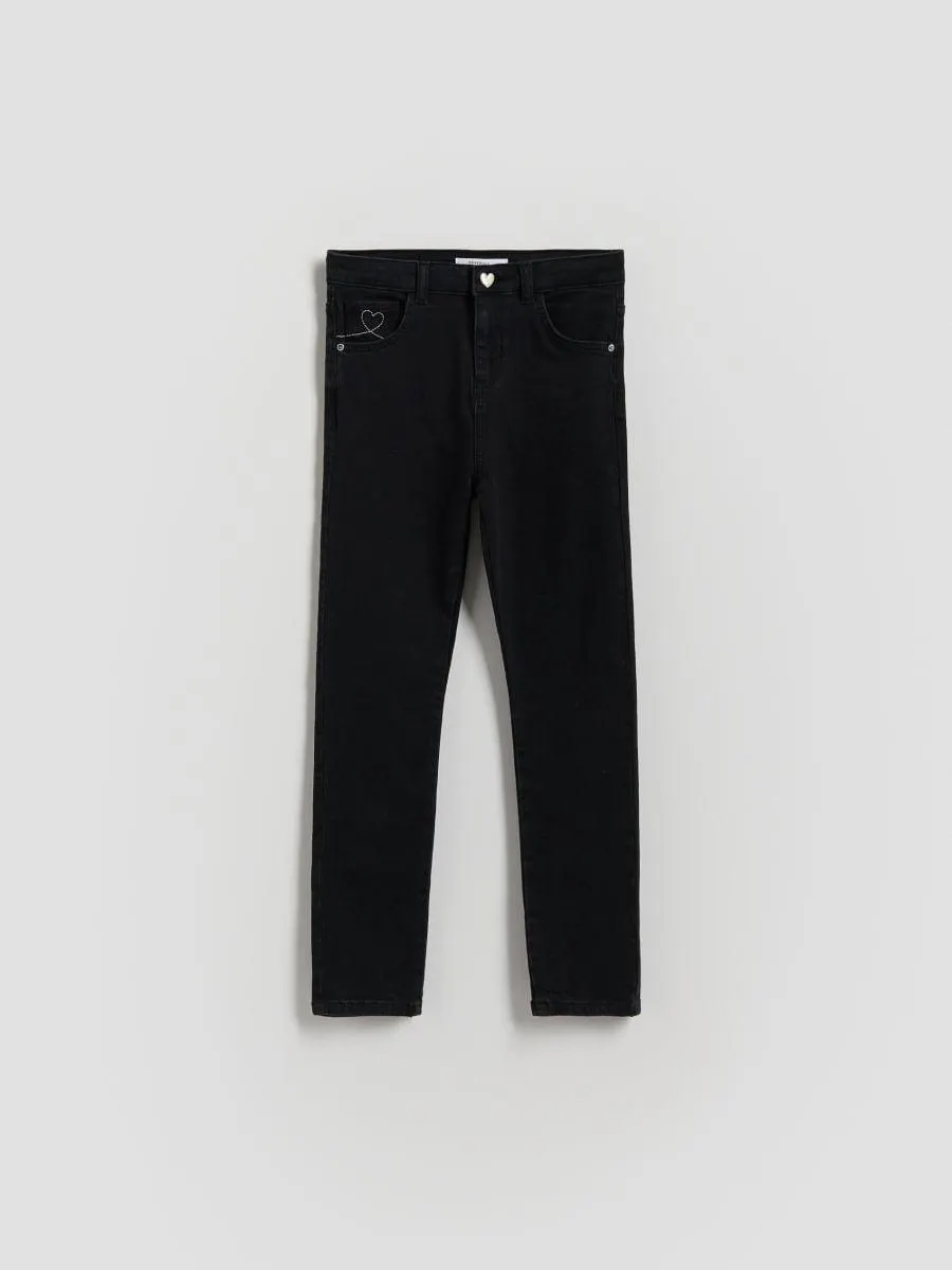 Jeggings slim fit s knoflíkem ve tvaru srdce