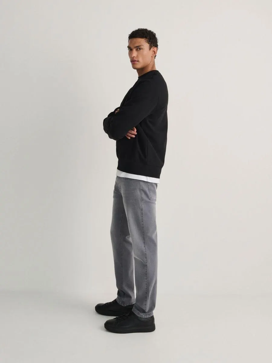 Džíny slim se sepraným efektem