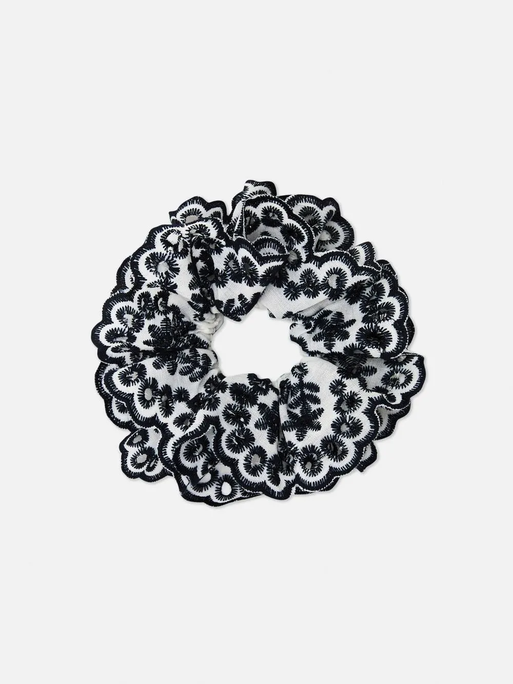 Haargummi mit Lochstickerei