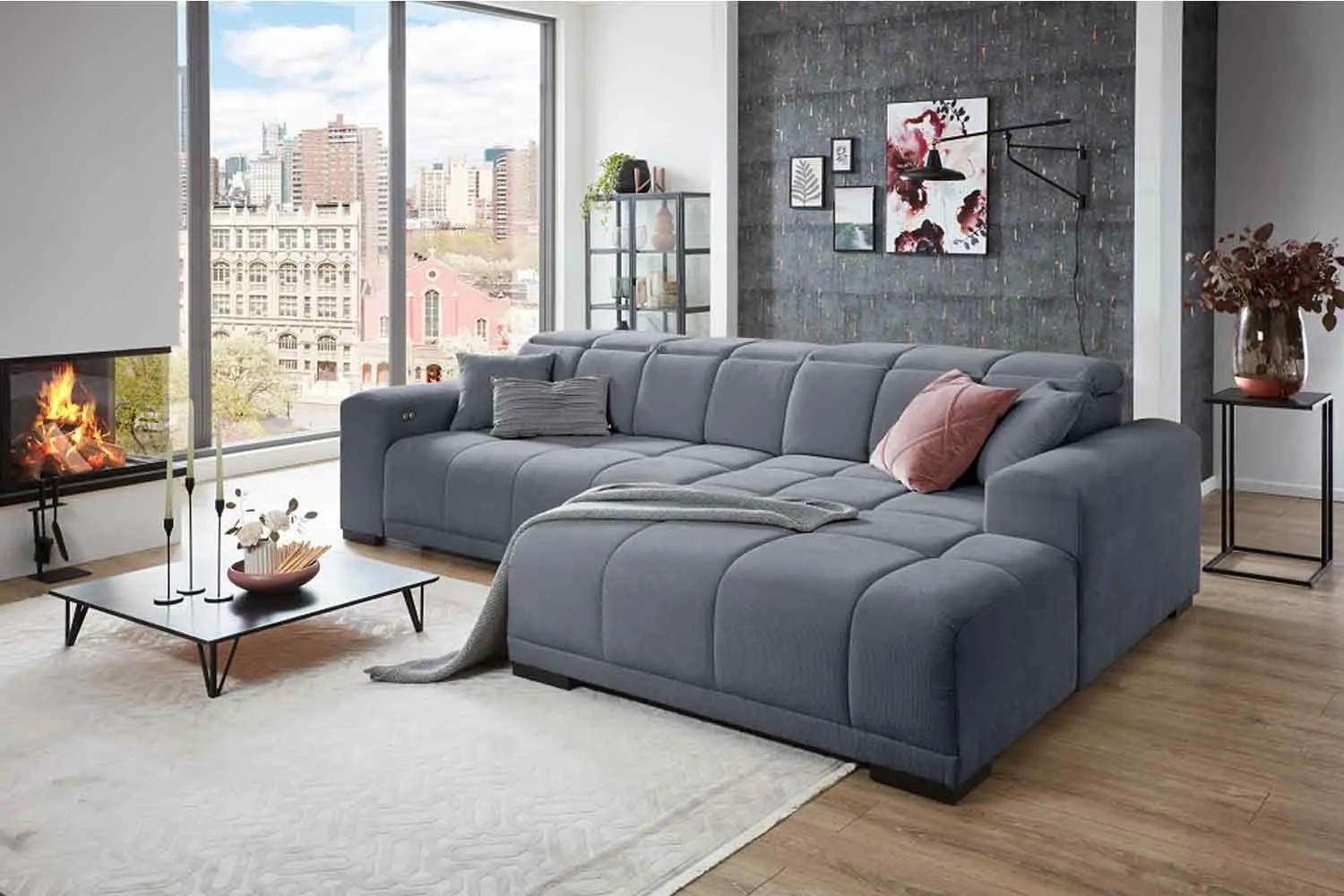 Ecksofa inkl. motorischem XXL- Sitzvorzug in Stoff